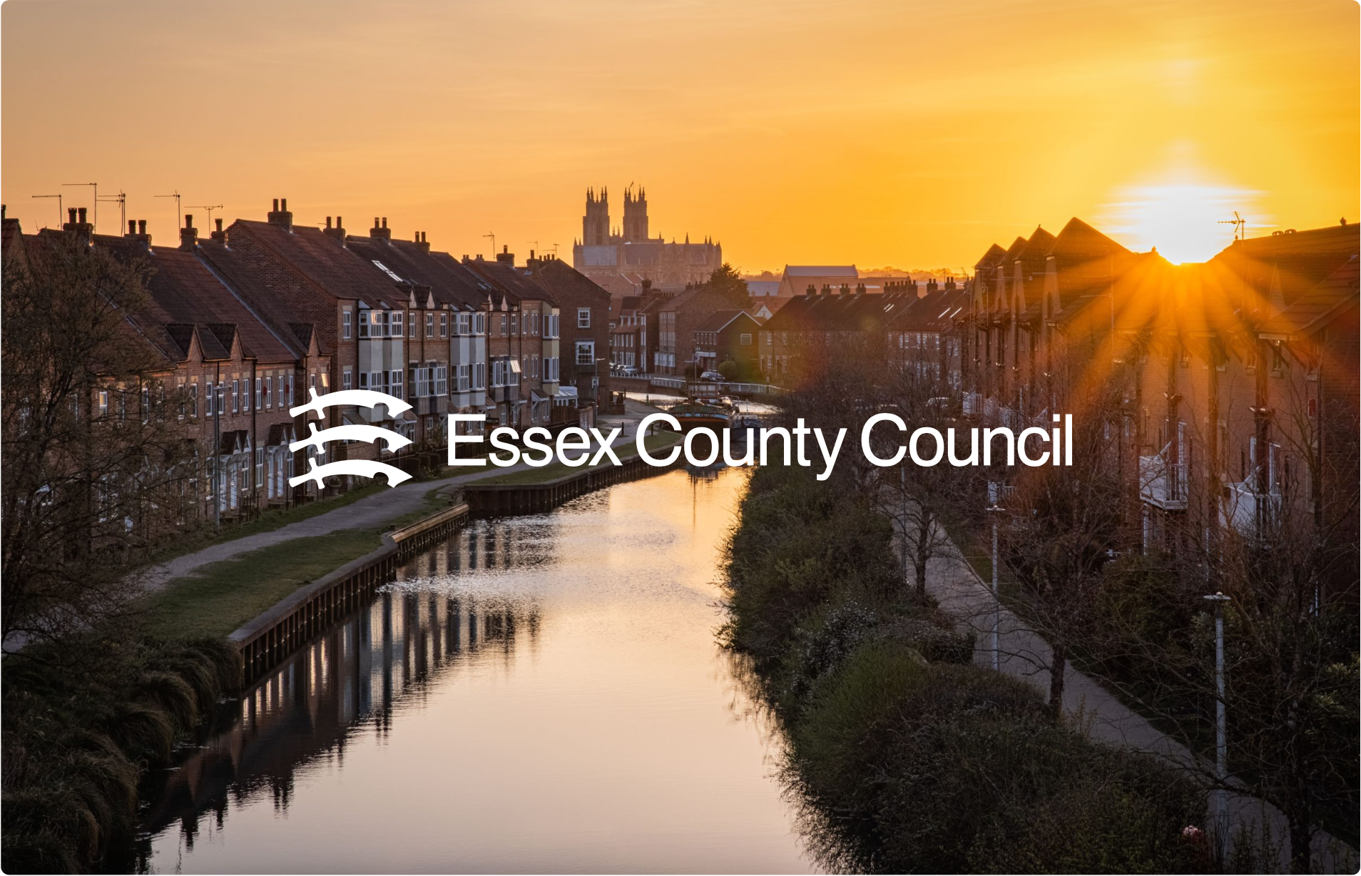 Essex County Council Logo with a background image of a town centre.