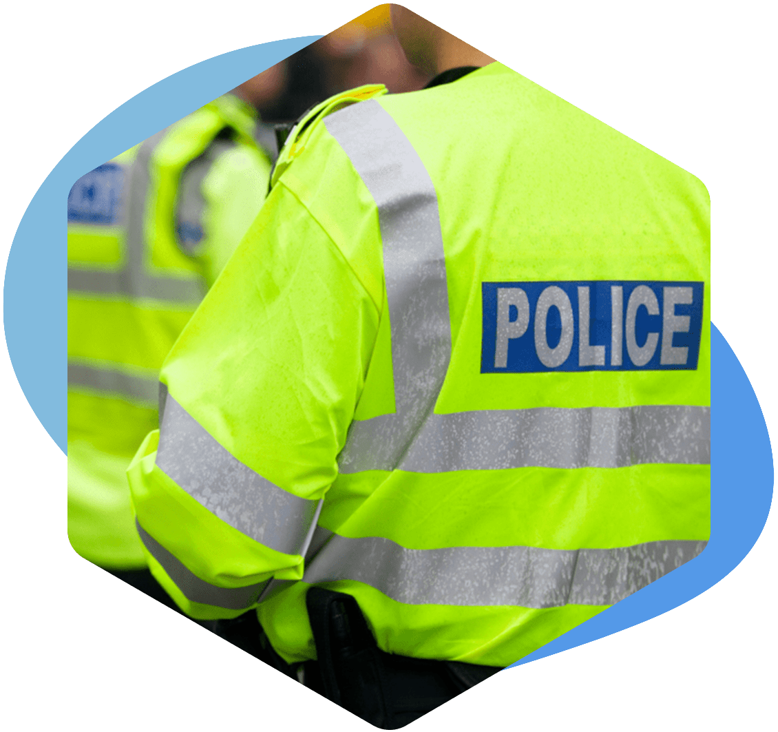Group of police men, stood wearing high vis