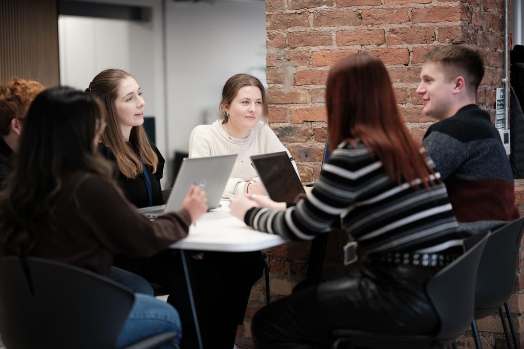 team discussing data governance